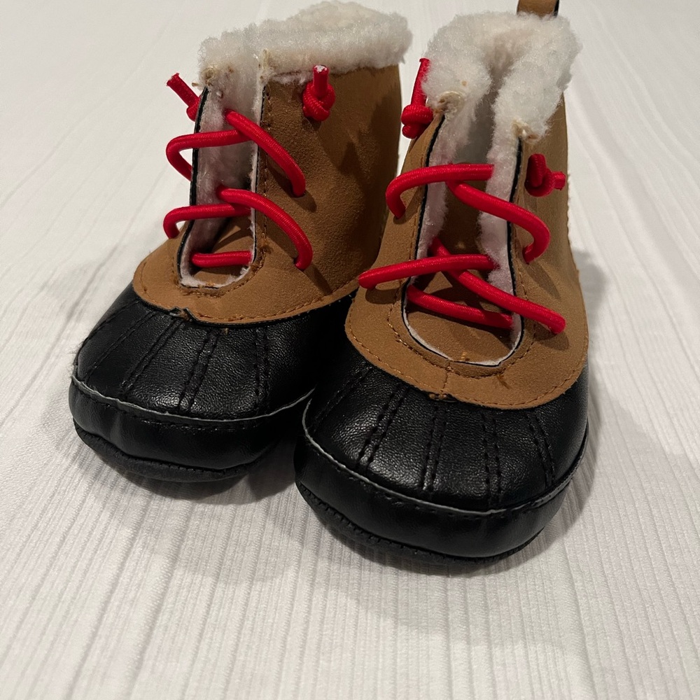 Carter’s infant fleece lined boots, lightly used. 3-6 months.